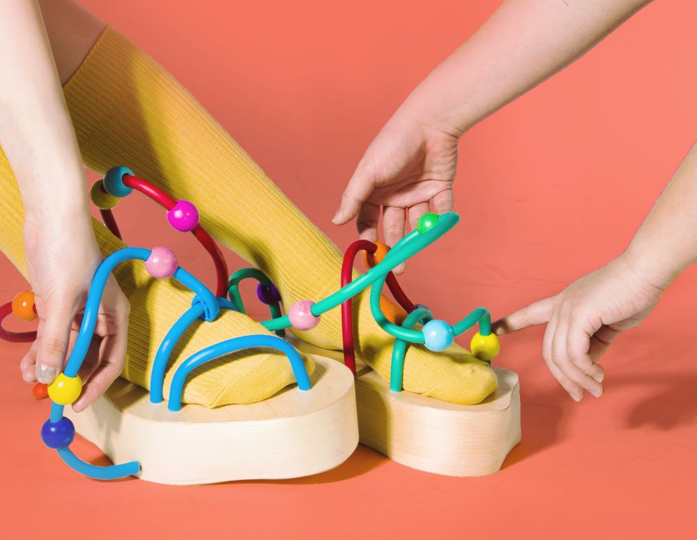 block sandles made with kids toy wiring and moveable beads