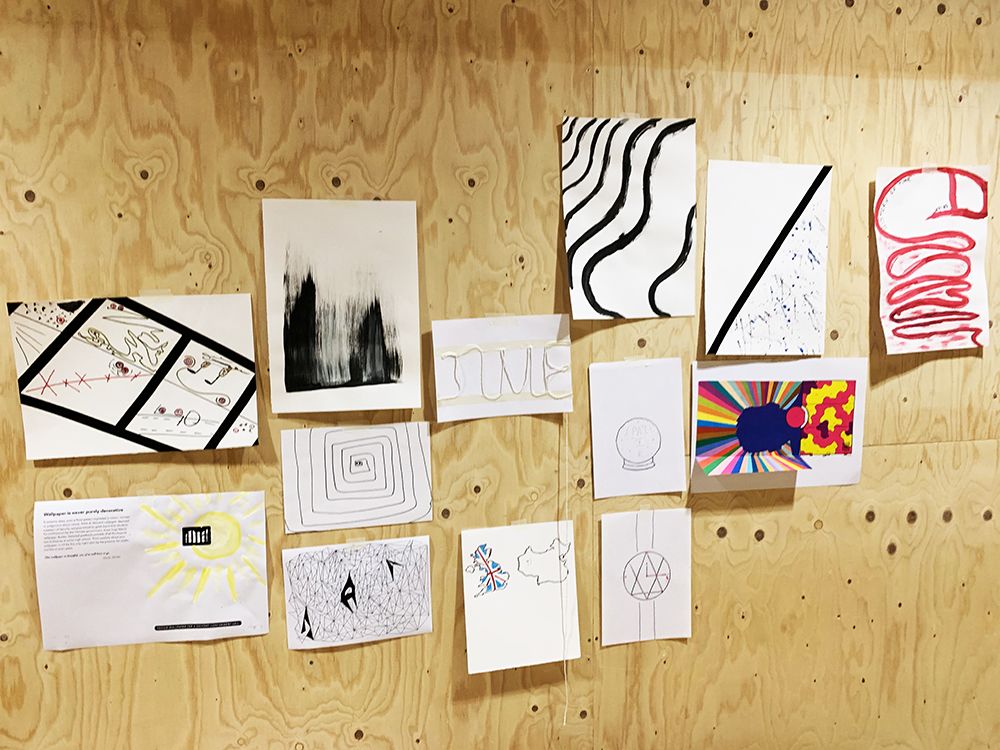Ekaterina Vdovichenko's 100 Design Projects work pinned to wall.