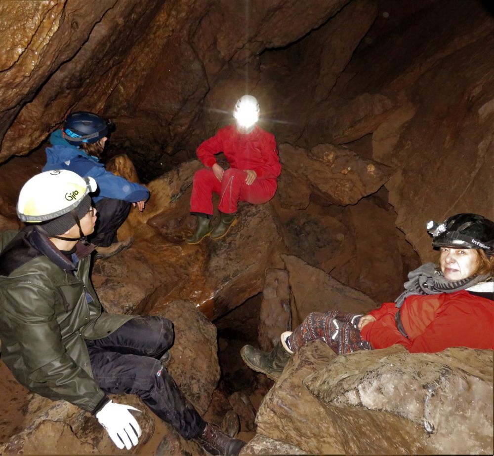 A group of students in a cave