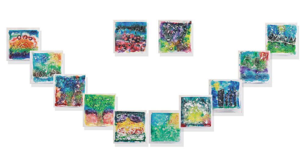 12 colourful paintings in a smiley face formation