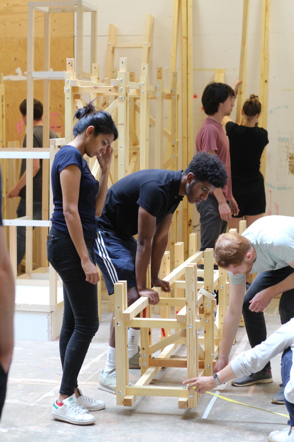 Students working with timber sections