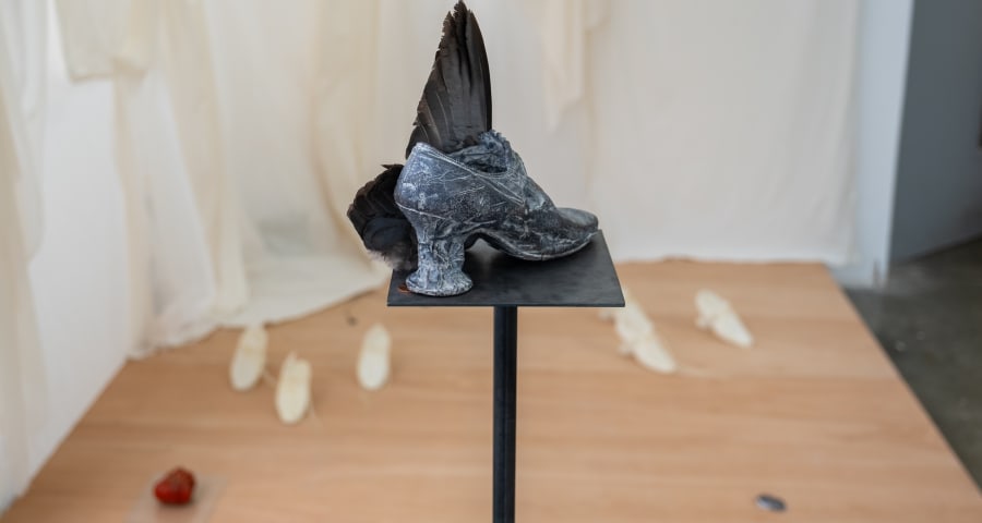 An iron casted heeled shoe