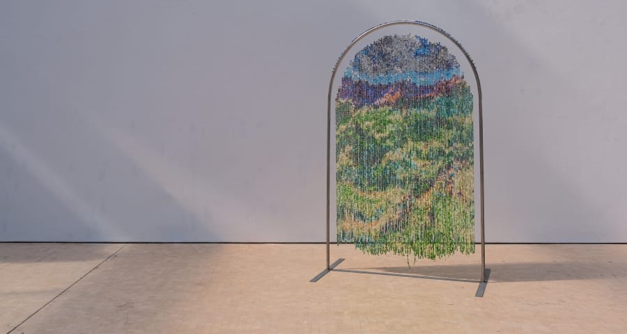 An arched freestanding artwork.