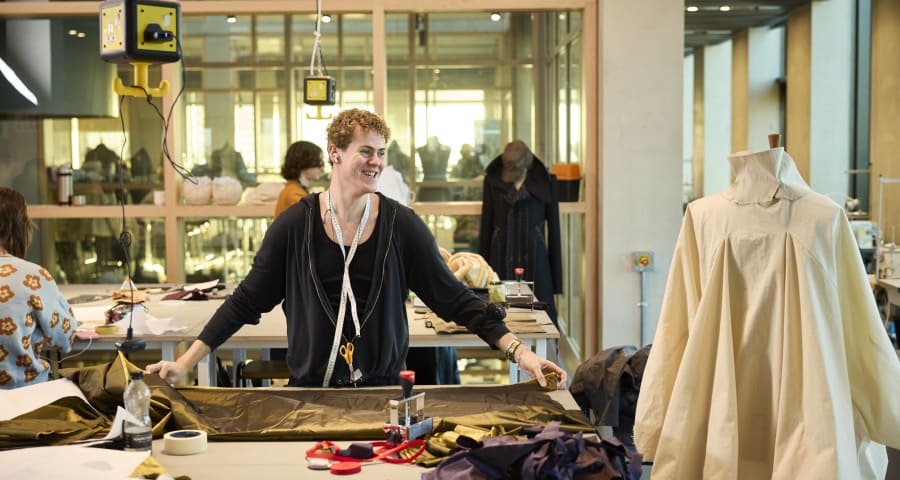 Male student working in design studio