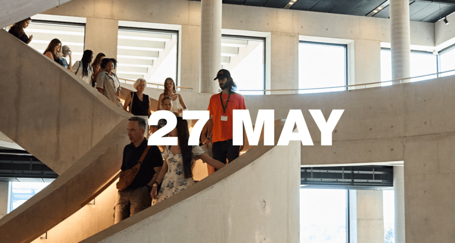 Tour group walking down LCF's main staircase, with '27 May' overlayed in white.
